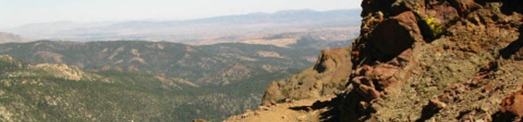 View North coming into view as we pass to the N side of Raymond Peak