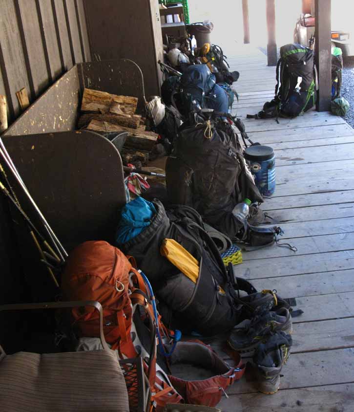 Backpacks of PCT hikers resupplying at Kennedy Meadows Pack Station.