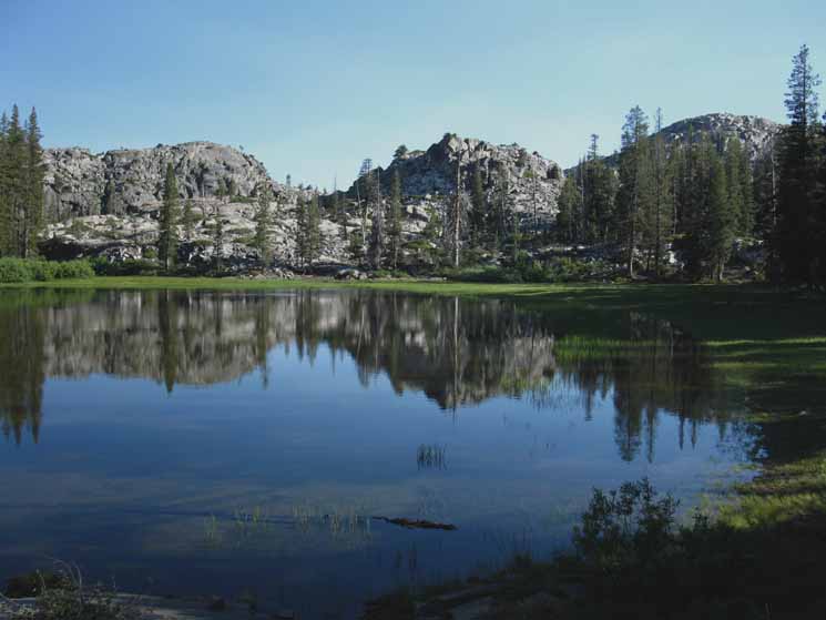 Granite features from Andrews Peak wrapping around Lake 7643 in Jack Main Canyon.