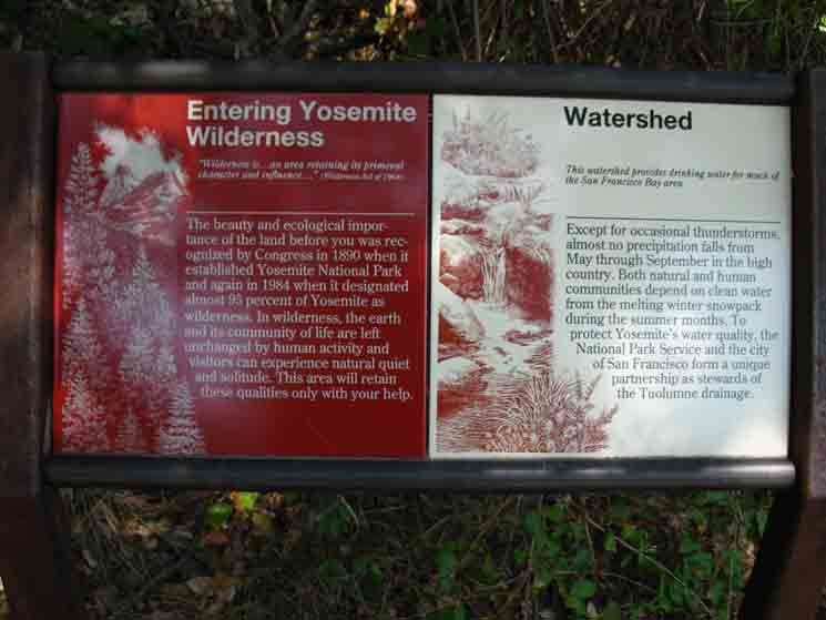 Wilderness boundary sign and notice at Hetch Hetchy Trailhead.
