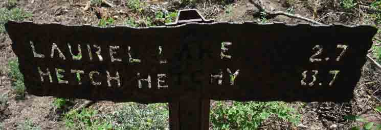 Trail sign down Moraine Ridge into the Grand Canyon of the Tuolumne River and Hetch Hetchy Reservoir.