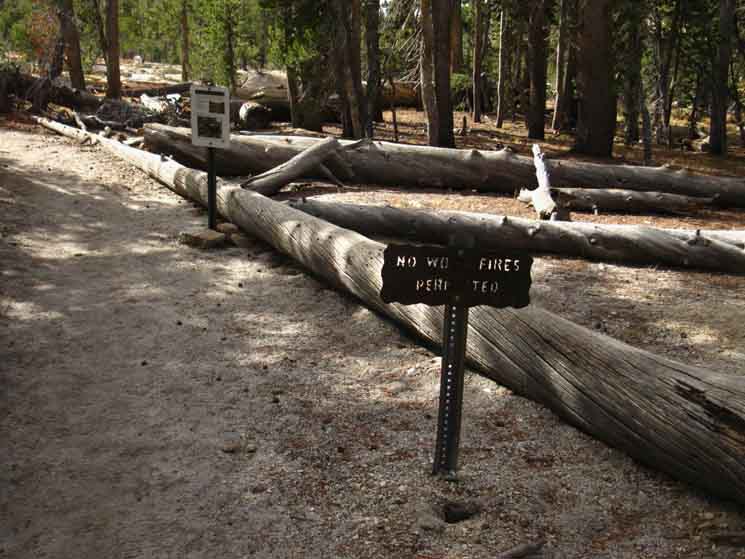 Trail sign marking Upper Cathedral Lake location and restoration.