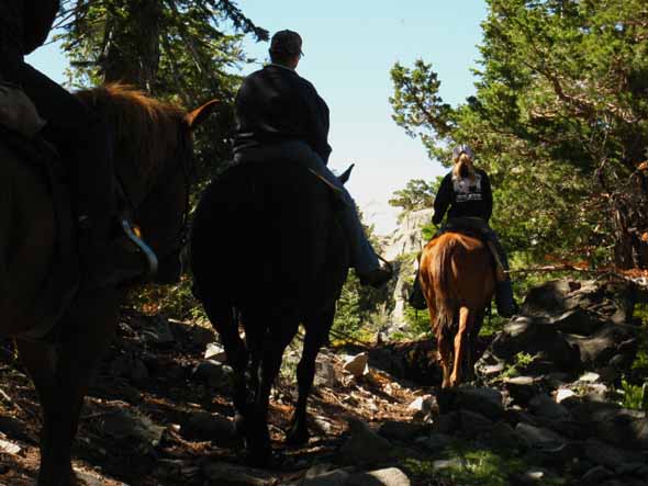 Corky's riders passing up the valley.